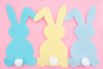 Easter bunny rabbit background on pink felt