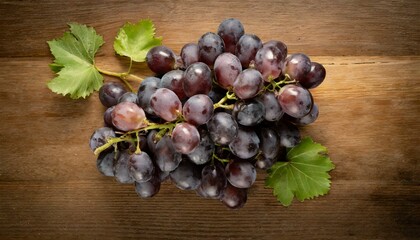 bunch of grapes on wooden background