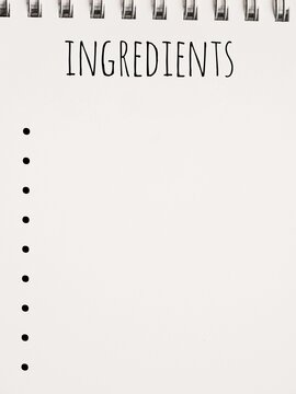 blank or empty ingredient list on a white spital notebook 