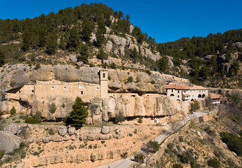 Fototapeta na wymiar Sanctuary of Virgin of Balma in natural grotto in mountain next to Spanish village of Sorita