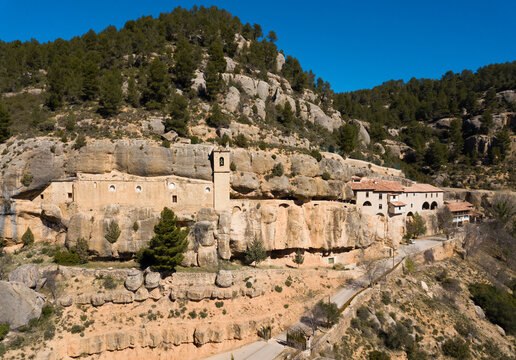 Sanctuary of Virgin of Balma in natural grotto in mountain next to Spanish village of Sorita