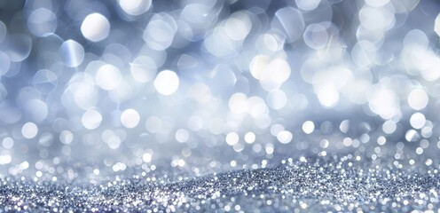 A sparkling silver glitter background with a beautiful bokeh effect, exuding luxury and a festive atmosphere, perfect for celebrations.