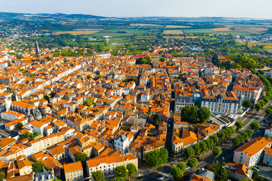 View from drone of houses of old town Riom at summer day, France