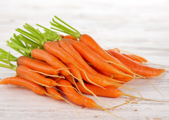 bunch of carrots on table