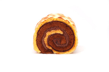 Tiger skin swiss roll cake isolated on white background. Bakery product photography