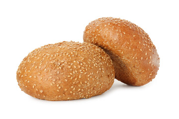 Two fresh hamburger buns with sesame seeds isolated on white