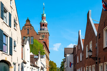 Obraz premium View to the tower of the town hall in Leer, Ostfriesland, Germany