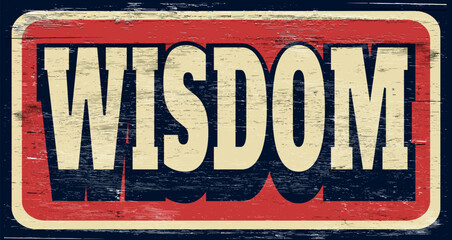 Aged and worn wisdom sign on wood. - 764415585