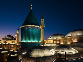 Fototapeta na wymiar Mevlana Celaleddin Rumi Tomb and Mosque (Mevlana Türbesi ve Cami) Night Lights Drone Photo, Mevlana Konya, Turkiye (Turkey)