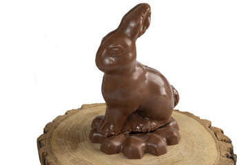 Fototapeta na wymiar Milk chocolate in the shape of a rabbit on a wooden board_3.