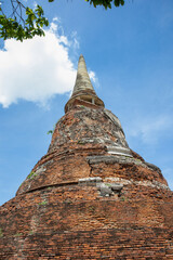 Fototapeta premium Wat Mahathat ancient at historical park at Ayutthaya Historical Park, Phra Nakhon Si Ayutthaya Province, Thailand