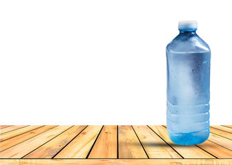 Bottle of cold water on table isolated on white.