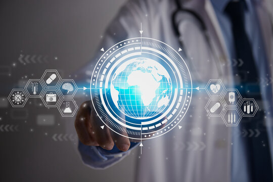 Doctor Hand and Finger Touch Screen Blue Globe and World or Earth Hud and Medical Equipment Icon. Medical Technology,Innovation,Science and Healthcare Concept