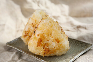 grilled rice ball onigiri on a table