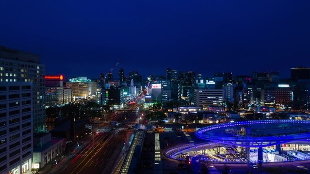 aerial night timelapse street road view among city center of Nagoya in Chubu region business district area