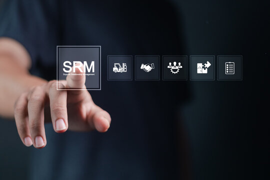 SRM, Supplier Relationship Management concept. Person touching SRM icon on virtual screen for cooperation business, supplier, risk management, strategy, contract and optimization.
