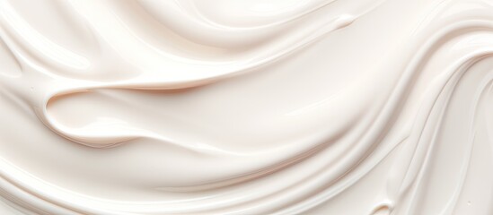 An up-close view of a white liquid with a swirling pattern captured in the image