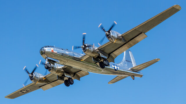 close up left front view of B-29 bomber Doc in flight as it makes a landing approach