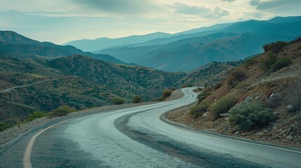 Asphalt road in mountainous terrain