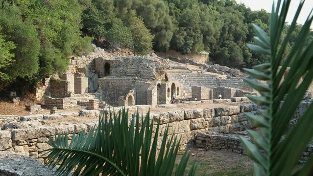 Ruins of Great Basilica in Butrint National Park, Buthrotum, Albania. Triconch Palace at Butrint Life and death of an ancient Roman house Historical medieval Venetian Tower surrounded. Butrint