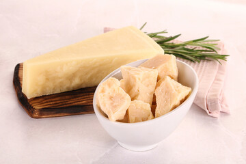 Chopped Italian hard parmesan cheese