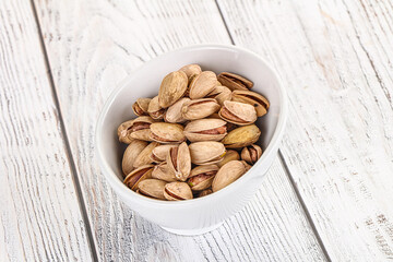 Salted tasty pistachio nuts heap