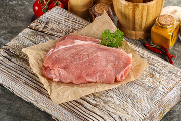 Raw pork schnitzel for cooking
