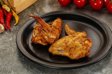 Tasty roasted chicken wing with spices
