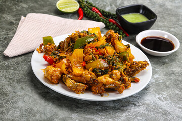Vietnamese cuisine - fried frog with vegetables