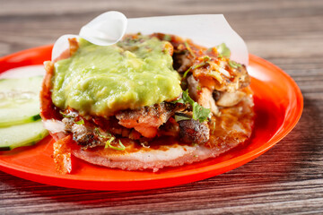 A closeup view of a chicken quesataco.