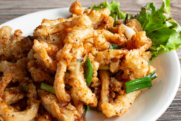 A view of a plate of Chinese fried squid.