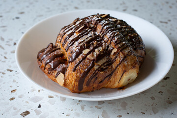A view of a chocolate almond croissant.