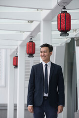 Chinese business man in modern Asian city