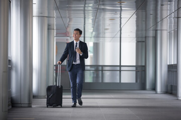 Chinese business man in modern Asian city