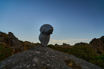 Monument of a dog head of Castro Laboreiro shepherd dog breed at the medieval Castle Ruins of...
