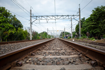 Railway tracks around settlements in rural areas in Indonesia