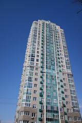 High-rise building against the background of windows, architecture of new buildings.