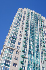 High-rise building against the background of windows, architecture of new buildings. - 764516551
