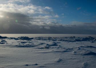 winter landscape by the sea, approaching snowfall, blurred snow background, blurred outlines