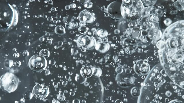 View From Underwater, Pouring Oil From Above, Bubbles Everywhere. Macro Abstraction.