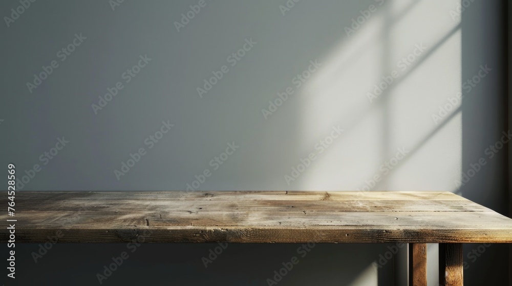 Poster a simple wooden table placed in front of a window. suitable for home decor or interior design concep