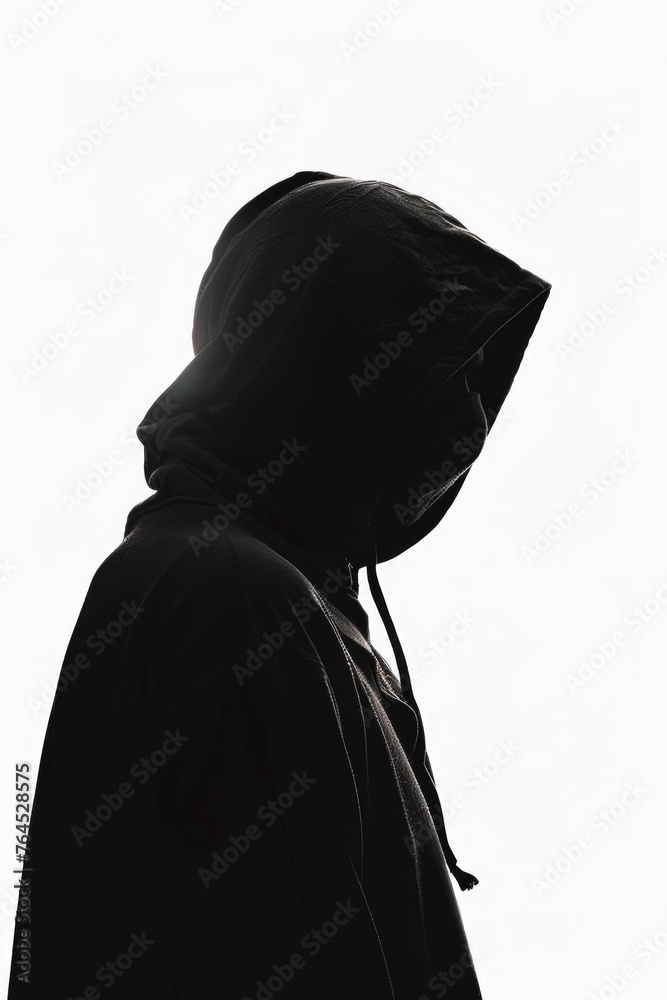Wall mural a silhouette of a person wearing a hoodie. suitable for various design projects - Wall murals