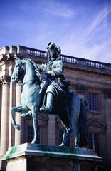 Statue of Louis XIV in front of versailles palace near Paris during 1990s