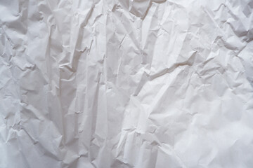 The texture of white paper is crumpled. Background for various purposes.crumpled white paper material