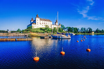 Boats in the harbour by Läckö castle in Sweden