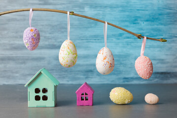 Easter Celebration with Colorful Eggs and Tiny Houses - 764539314