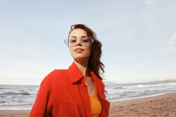 Smiling Woman, Embracing Freedom: A Colourful Trendy Portrait at the Beach