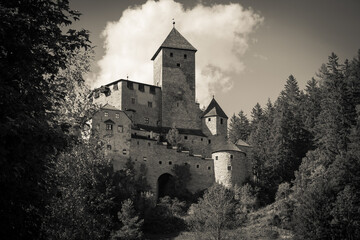 Black and white view of medieval castle in Campo Tures, Valle Aurina, Italy - 764546750