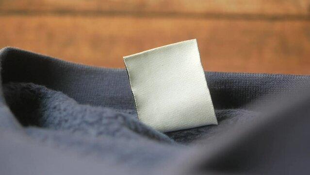 empty white label on a cloth 