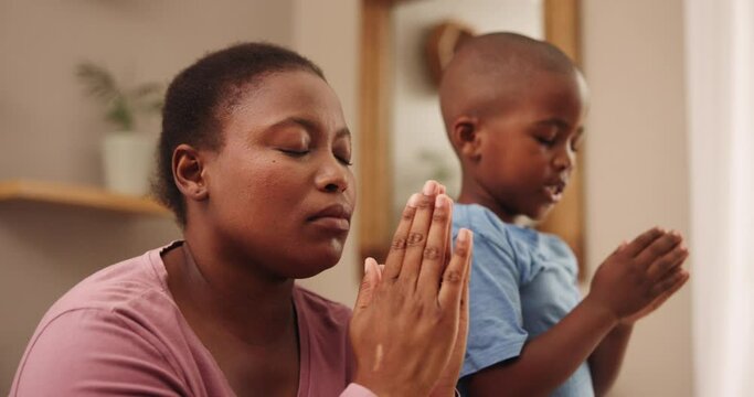 Mother, child and home for praying, faith and religion with learning, spiritual and speaking to God. African family, mom and kid with hands together for worship, hope and teaching of Christian prayer